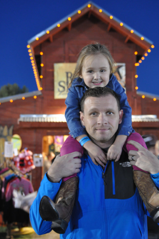 Courtyard_Dad Daughter_on Shoulders.JPG