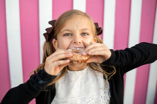 Donuts_Girl_Eating big bite 2_RJ.jpg