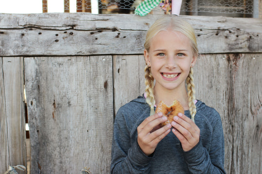 Donuts_Girl_Smile bite.jpg