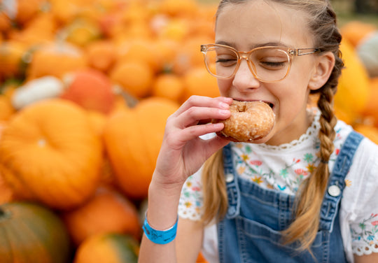 Donuts_Girl_eating 1_RJ.jpg