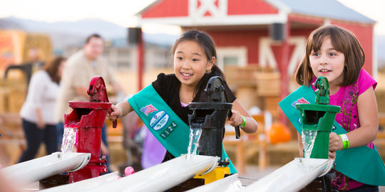 Duck Races_Girl Scouts_Smiling racing.jpg