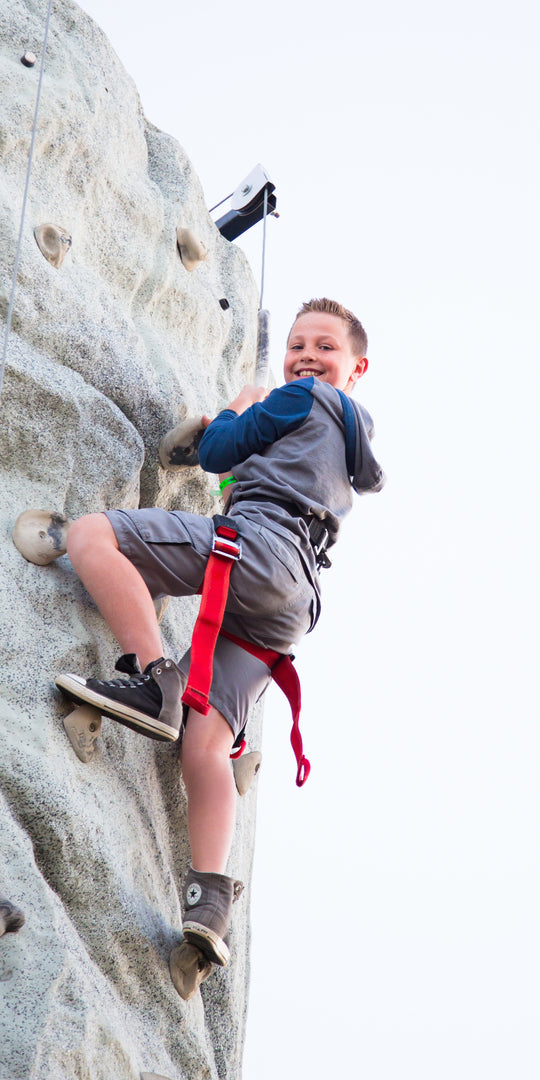 Rocking Climbing_Boy_smiling looking down.jpg