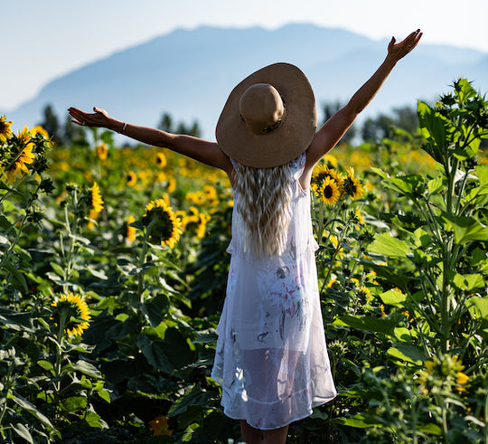 Sunflower Field_Woman_Dancing Arms Up Hat.jpg